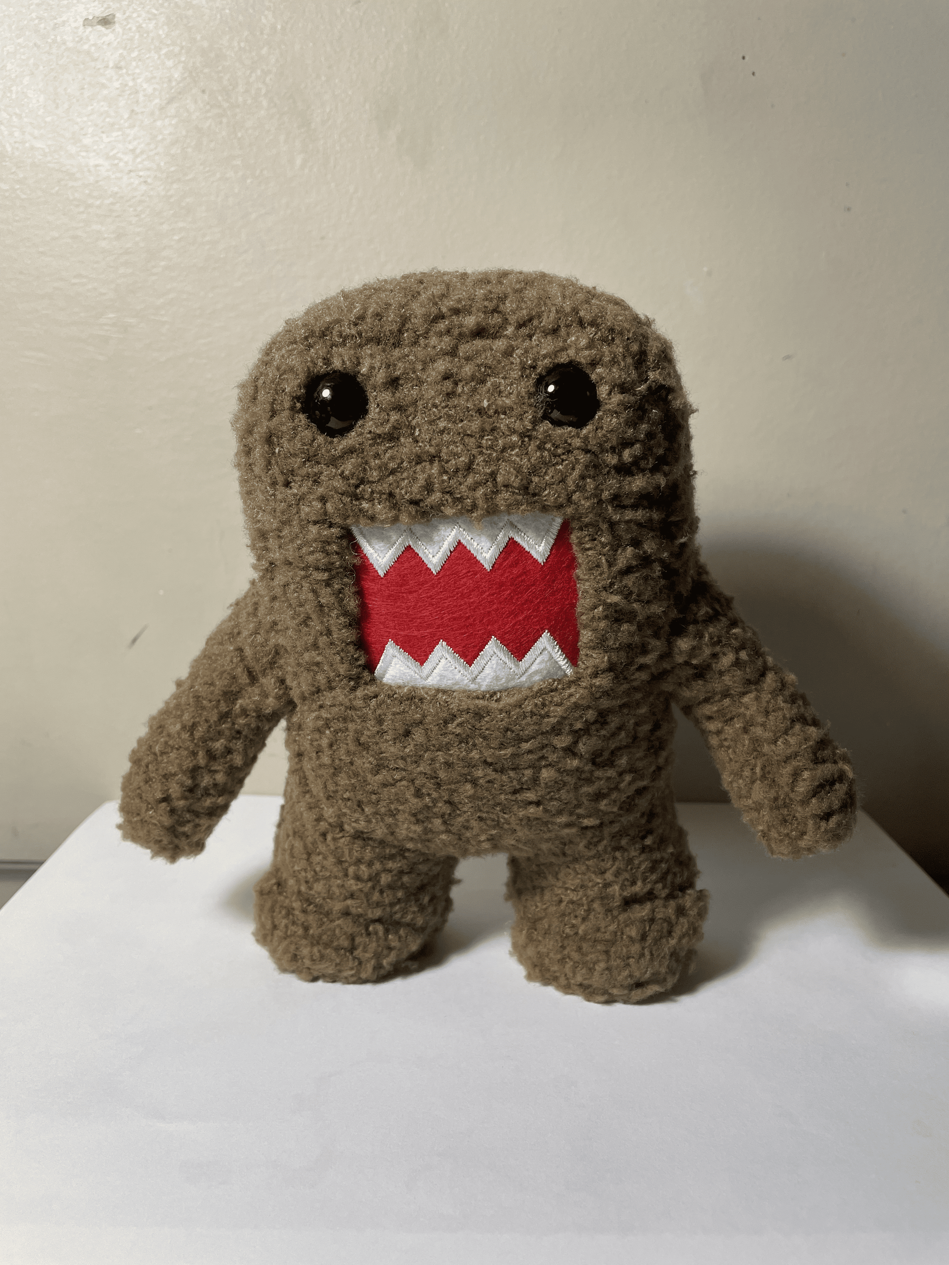 A front view reference image of the dumo plushie. After struggling with the duck plushie last week, I still wanted to try modeling a stuffed animal, but maybe a more simpler model. I thought the dumo plushie would be fine to model given it's rectangular shape.