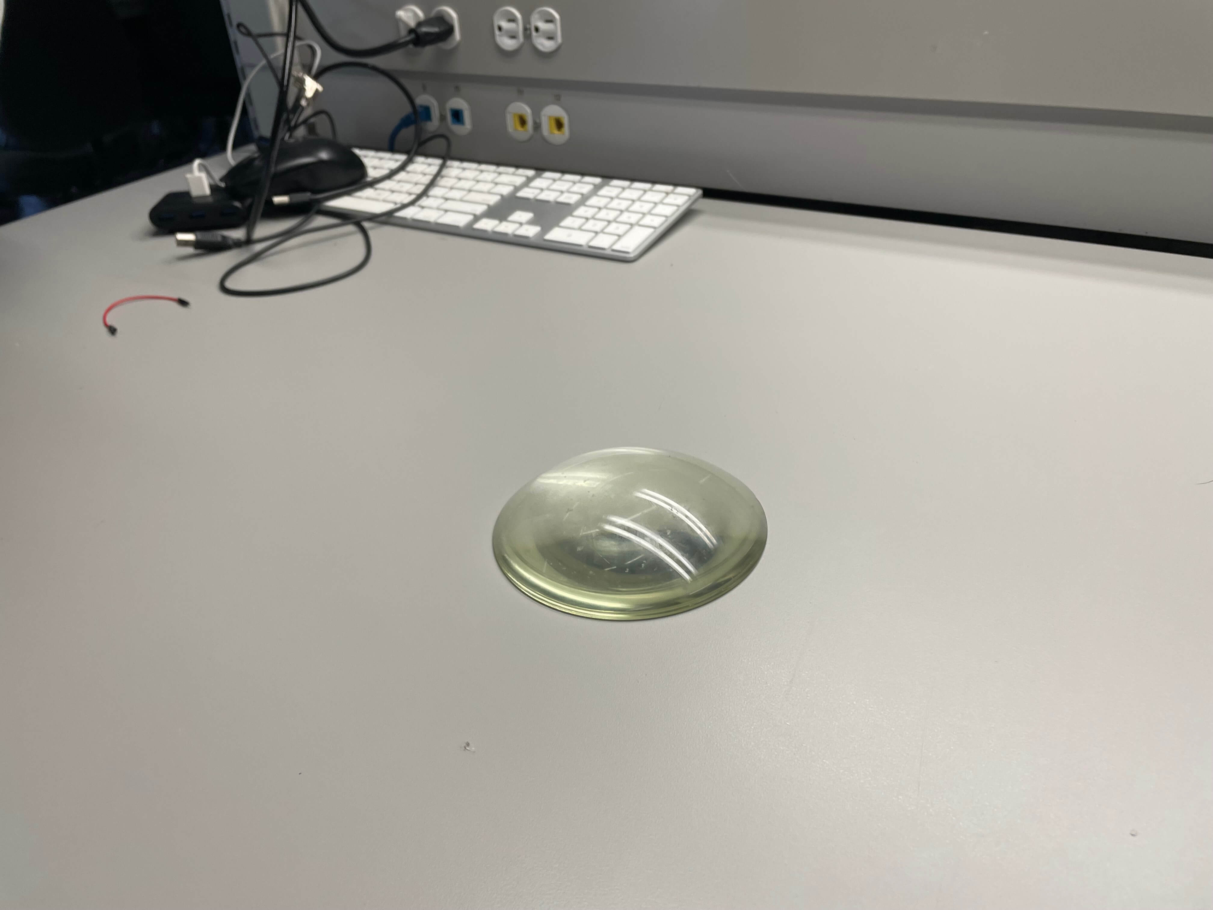 <ul><li>Material state: refined</li>
<li>Material plasticity: rigid </li>
<li>Material use: decoration or photography (fish eye lens)</li>
<li>Smooth all around. Flat at the bottom.</li>
<li>transparent</li></ul>