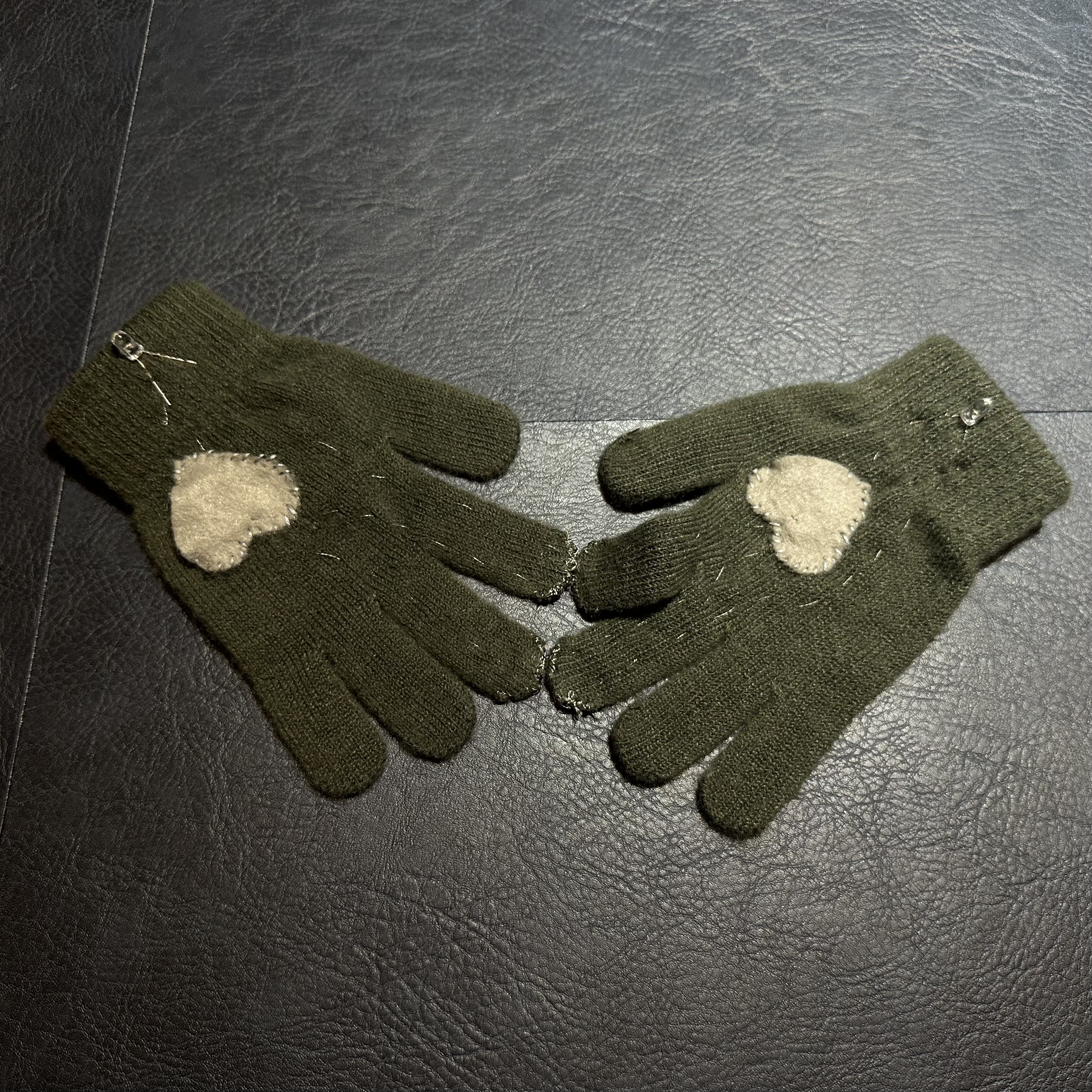 If the gloves aren't touching hard enough or not at all, the light will not be on because there is no connection between the gloves.