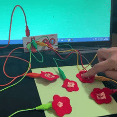 Besides fabrication tools, I created a simple interactive garden design. I connected myself to the ground, so when I press the center of each flower, it would trigger the sound from the p5 sketch.